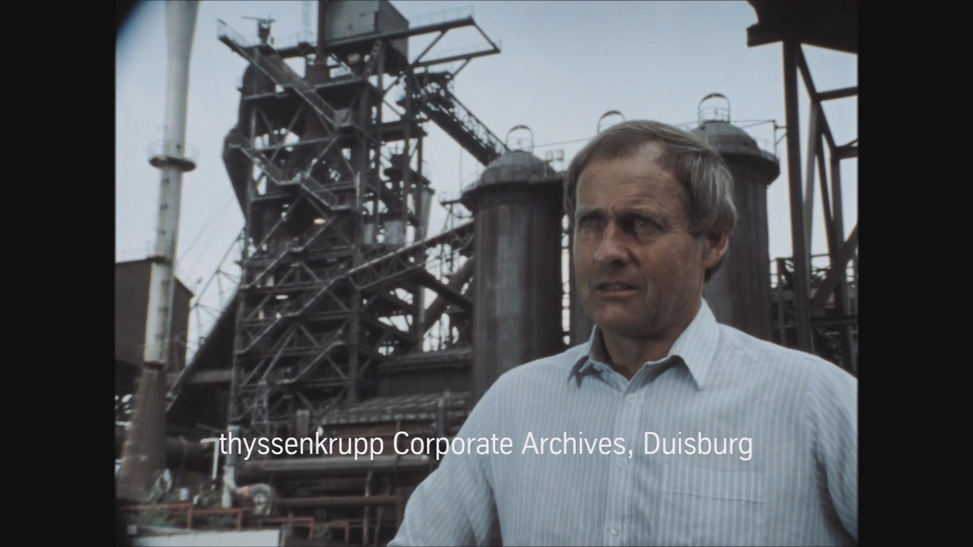 Standbild aus "Landschaftspark Duisburg Nord [!]. Die stillgelegte Meidericher Eisenhütte": Karl Ganser, der geschäftsführende Direktor der IBA Emscher Park, 1990